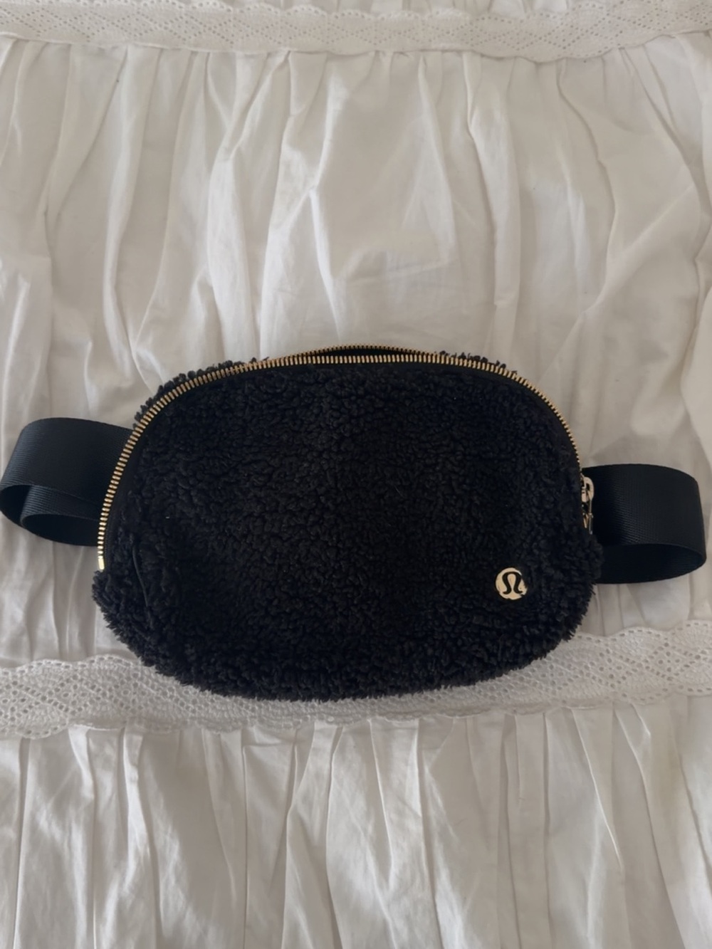 lululemon Everywhere Belt Bag in black fleece with gold hardware